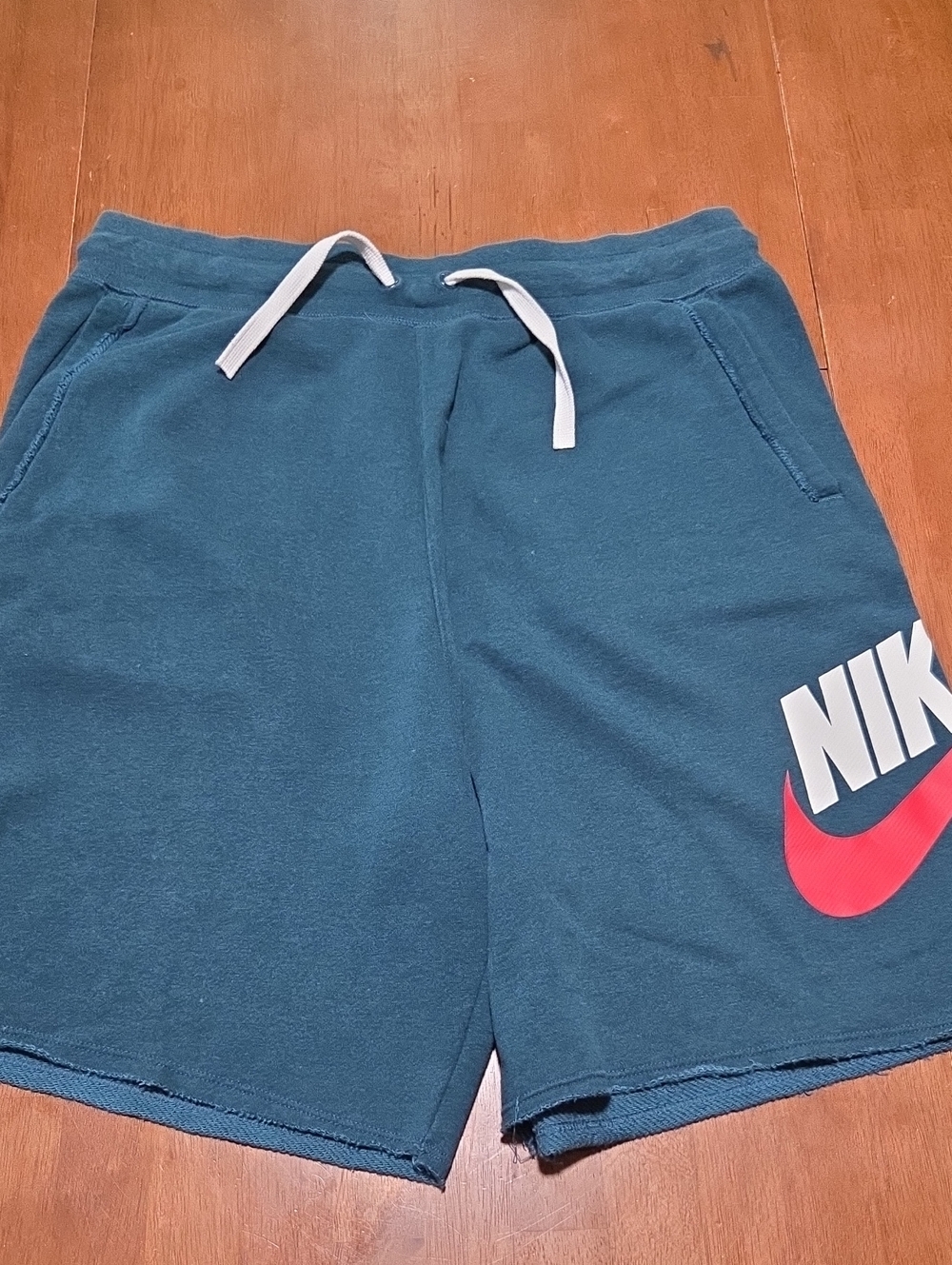 Nike Men's Teal Athletic Shorts with White Drawcord and Red Swoosh